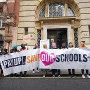 Teacher members of the National Education Union (NEU) outside the Department for Education during a rally in central London