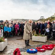 Laying  wreaths at the Budleigh Salterton war memorial