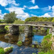 This medieval clapper bridge crosses the East Dart River at Postbridge on Dartmoor. Photo: Andrew Michael/iStock/Getty Images Plus