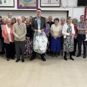 Lions Richard (centre) and Tom (far left) with members of the dancing club