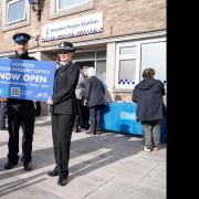 Alison Hernandez and police officers at official opening of front desk at Honiton Police Station