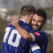 Callum Shipton celebrates with goalscorer Tom Bath in a previous match