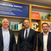 Branch manager Micheal Roberts and Nationwide staff with East Devon MP Simon Jupp