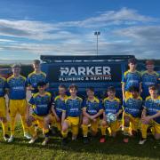 Lympstone U14s presented with their new away kit for next season