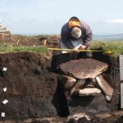 Excavating the cist at Whitehorse Hill in 2011