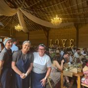 The Krispies team with wedding guests eating their fish and chips