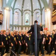 The Rock Choir East Devon singing at the concert