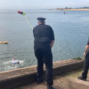 Police officers train for saving lives at sea