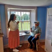 Volunteers and staff trying the virtual reality headset