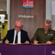 Armed Forces Covenant was signed by Councillor Paul Arnott and Major Mark Latham RM