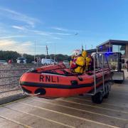 Exmouth RNLI inshore lifeboat launching.