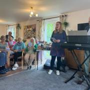 Julia leading the Harvest service