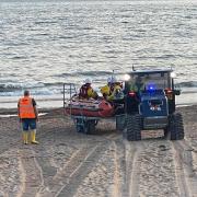 Exmouth RNLI inshore lifeboat being launched. (Library image).