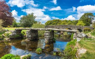 This medieval clapper bridge crosses the East Dart River at Postbridge on Dartmoor. Photo: Andrew Michael/iStock/Getty Images Plus