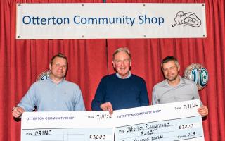 From left: Alasdair Cameron, Otterton Relief in Need Charity, Jeremy Wakeling, chairman of the Otterton Community Shop committee and Richard Witherby, chairman of the Village Hall committee